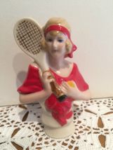 SUZZANE WITH RACKET